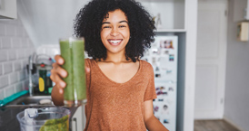 Woman drinking a smoothie.