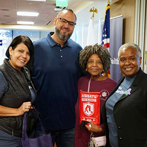 Medicare Advantage members posing at health expo